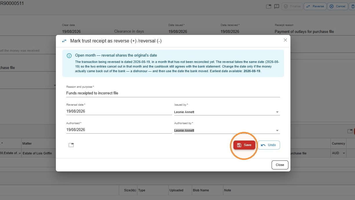 Reverse trust receipt dialog with the reversal reason entered and Save highlighted